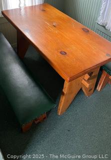 Knotty Wood table with padded bench seats