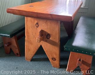 Knotty Wood table with padded bench seats