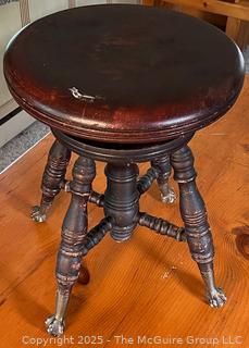 Swivel stool w/glass marble legs in brass talons