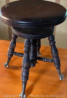 Swivel stool w/glass marble legs in brass talons