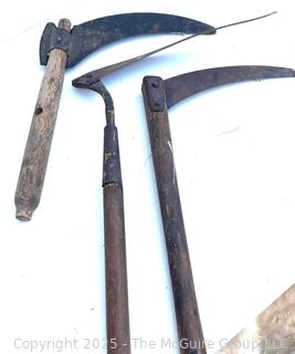 Three (3) antique hand sickles 