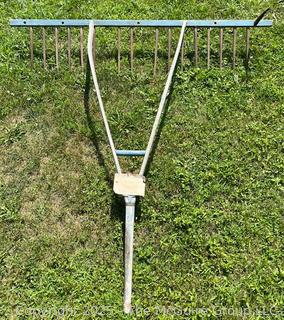 ID'ed as Wooden Bull Rake for gathering cut hay