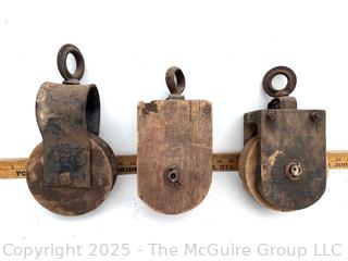 Three (3) Wooden Pulleys