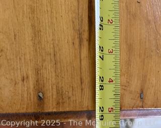 Knotty pine three drawer keyed dresser