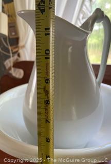 White Ceramic Wash Basin and Pitcher