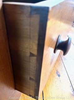Four-drawer oak(?) keyed dresser, curved top drawer panel