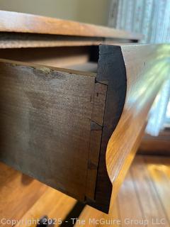 Four-drawer oak(?) keyed dresser, curved top drawer panel