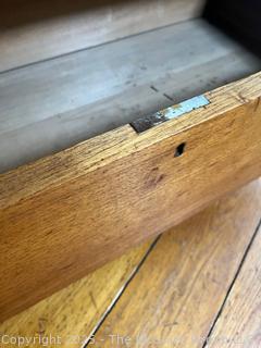 Four-drawer oak(?) keyed dresser, curved top drawer panel