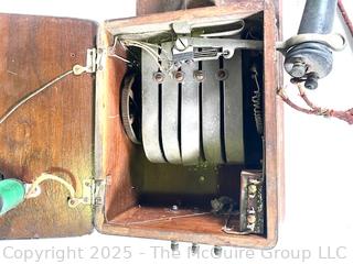 Similar to a vintage CHICAGO TELEPHONE SUPPLY CO. Oak Wood Double Box Wall Phone, incomplete