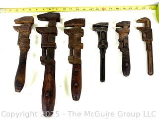 Group of six (6) antique monkey wrenches including COES WRENCH CO. MONKEY WRENCH WITH WOODEN HANDLE 8 1/2' WORCHESTER. MASS