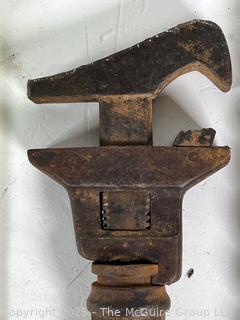 Assortment of antique hand tools: wrenches, drill bit, etc.