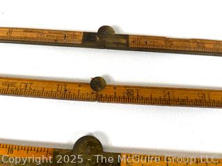 Four (4) Folding Wood Carpenters Rulers