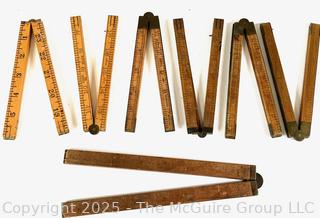 Seven (7) Folding Carpenters' Rulers