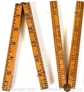 Seven (7) Folding Carpenters' Rulers
