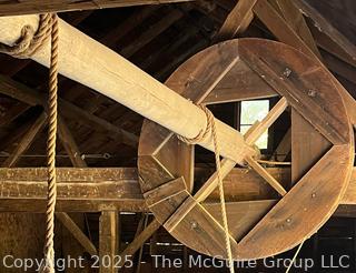 Large Wooden Wheel and Shaft. Often Referred to as a Compass Arm Wheel, Used for Lifting or Engaging Components. Wheel 6' Diameter.  Shaft Length 24'