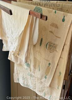 Grouping of Kitchen Ingredient Sacks Including Sugar and Flour and Kitchen Towels. See All Photos in the Gallery 