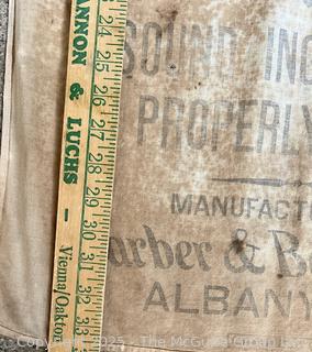 Grouping of Kitchen Ingredient Sacks Including Sugar and Flour and Kitchen Towels. See All Photos in the Gallery 