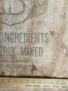 Grouping of Kitchen Ingredient Sacks Including Sugar and Flour and Kitchen Towels. See All Photos in the Gallery 