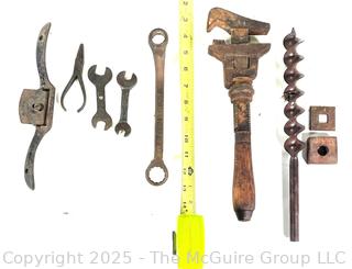 Grouping of Antique Hand Tools Including Monkey Wrench, Hand Drill Bit,  Pliers and Drawshave