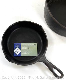 Cast Iron Frying Pan (#3) and Long Handled Pot 