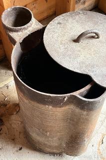 Metal Coal or Wood Fired Tank Heater Used to Keep Cattle Water Troughs From Freezing in Winter