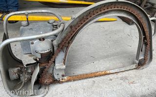 DOLMAR CB 50 Antique Chain Saw w/ Distinctive Bow Bar Designed for Easier Bucking of Wood on the Ground w/Out Excessive Bending. Dolmar is a German Company That Developed the First Gas Powered Chain Saw in 1927