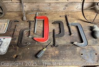 Eclectic Lot Including Jumper Cables, C Clamps, Tire Iron, License Plates and Hubcap