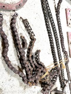 Grouping of Farm Tools and Supplies Including Chains, Grinder, Oil Cans and Barn Hinges. 