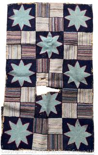 Hooked Rug. Damaged. Measures 24 x 40"