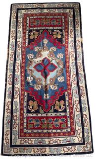 Hooked Rug. Center Tear. Measures 36 x 71"