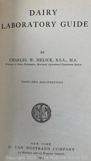 Grouping of Books Including Dairylea 100 Years of Service, Sears Roebuck 1909 Catalogue,  Dairy Laboratory Guide by Charles W. Melick, Little Pillows by Havergal and The Man Without a Country by Edward Everett Hale
 