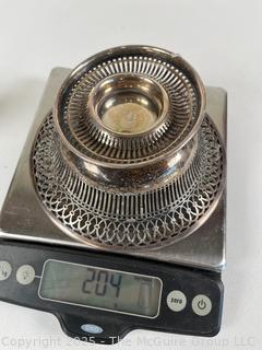 Servingware Including Sterling Weighted Candlesticks and Pierced Sterling Bowl