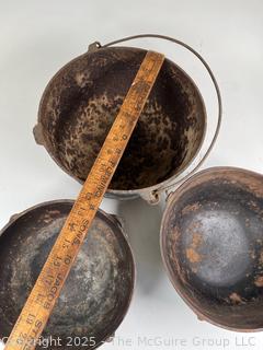 Three (3) Cast Iron Pots