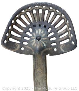 Cast Iron Operator Seat Attached to Long Wooden Tongue