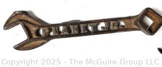 Grouping of Farm and Bench Tools Including Planet Jr. Plow Points and Branded Wrench, Marking Gage, Cow Bell, Hand Crank Jack, Oil Cans, Multi-Tool, Horseshoes and Wood Plane
