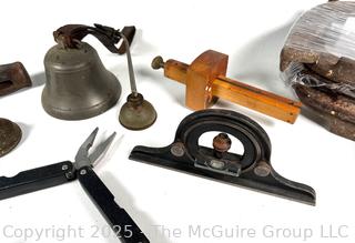 Grouping of Farm and Bench Tools Including Planet Jr. Plow Points and Branded Wrench, Marking Gage, Cow Bell, Hand Crank Jack, Oil Cans, Multi-Tool, Horseshoes and Wood Plane