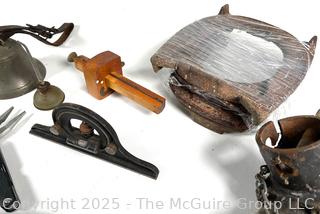 Grouping of Farm and Bench Tools Including Planet Jr. Plow Points and Branded Wrench, Marking Gage, Cow Bell, Hand Crank Jack, Oil Cans, Multi-Tool, Horseshoes and Wood Plane