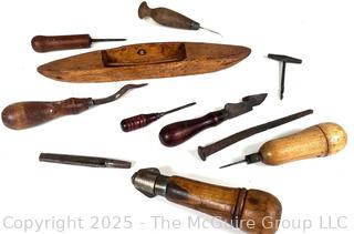 Grouping of Tools Specific to Weavers and Textile Arts, Including a Shuttlecock