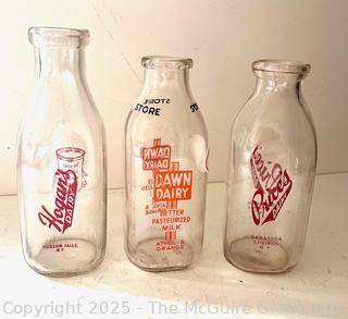 Three (3) Milk Bottles: Hogan's, Dawn, Prices