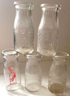 Five (5) Cream Bottles: Delong's, Trudeau's, Lambert & Son, Clarkson's