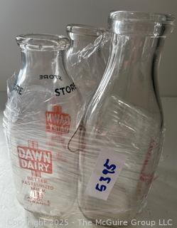 Three (3) Milk Bottles: Price's, Dawn and Hogan's