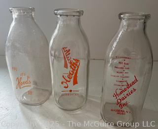 Three (3) Milk Bottles: Hood's, Heaths and Homestead