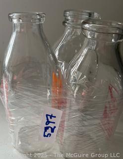 Three (3) Milk Bottles: Ronnybrook, Alex Dzembo and LePage's