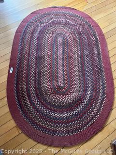 Oval Woven Rag Rug . Measures 49 x 73"