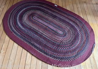 Oval Woven Rag Rug . Measures 49 x 73"