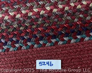 Oval Woven Rag Rug . Measures 49 x 73"
