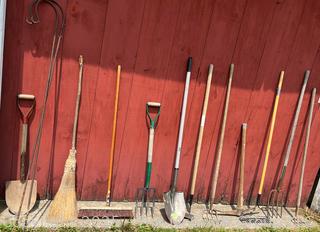 Collection of Lawn and Garden Tools Including Shovels, Push Broom, Shepherds Crooks, Hoe, Rakes, Pitch Forks and Pic Axe