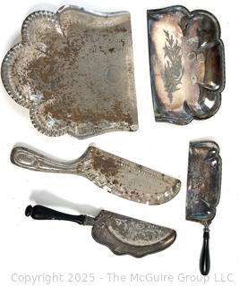 Group of plated "crumb trays"