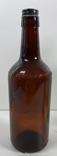 Group of antique glass bottles: various brands