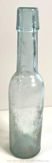 Group of antique glass bottles: various brands